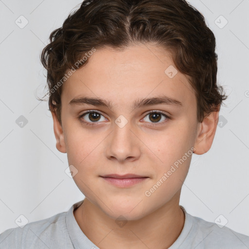 Joyful white child female with short  brown hair and brown eyes