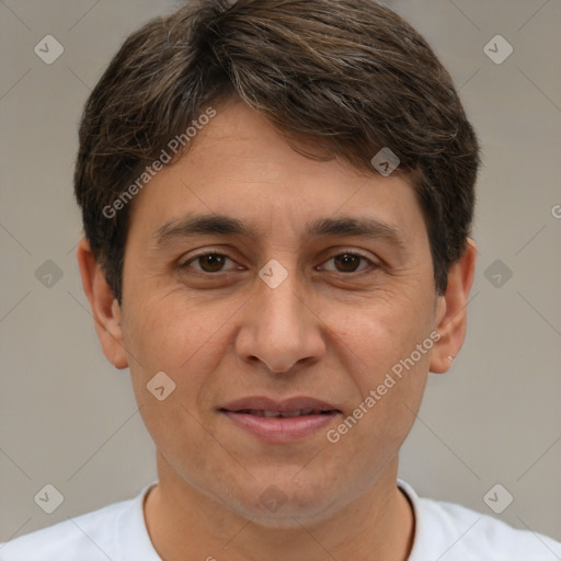 Joyful white adult male with short  brown hair and brown eyes