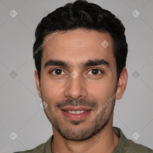 Joyful white young-adult male with short  black hair and brown eyes