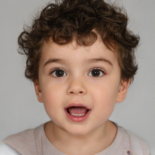 Joyful white child male with short  brown hair and brown eyes