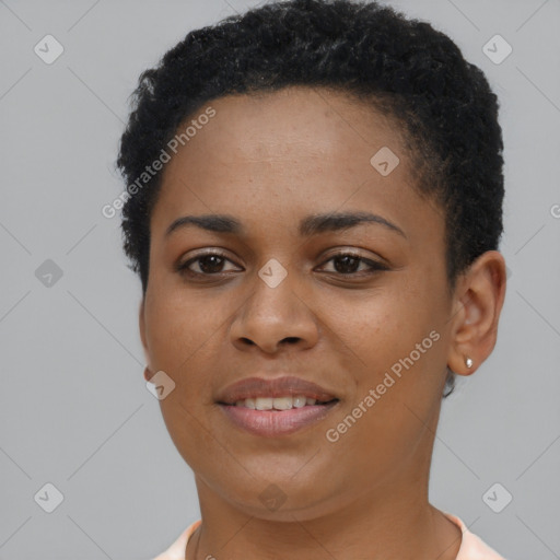 Joyful black young-adult female with short  brown hair and brown eyes