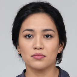 Neutral asian young-adult female with medium  black hair and brown eyes