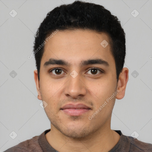 Neutral latino young-adult male with short  black hair and brown eyes