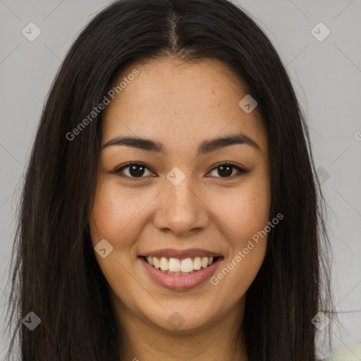 Joyful asian young-adult female with long  brown hair and brown eyes