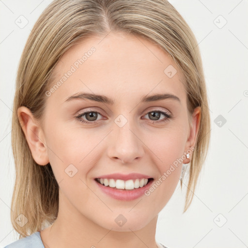 Joyful white young-adult female with medium  brown hair and blue eyes