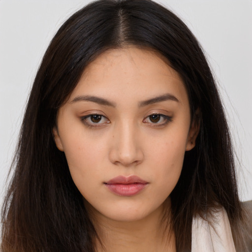 Neutral asian young-adult female with long  brown hair and brown eyes