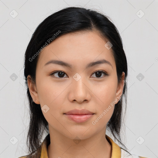 Joyful asian young-adult female with medium  black hair and brown eyes