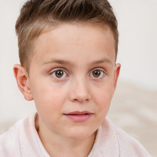 Joyful white child male with short  brown hair and grey eyes