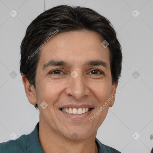 Joyful white adult male with short  brown hair and brown eyes