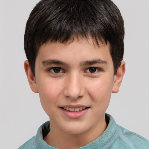 Joyful white child male with short  brown hair and brown eyes