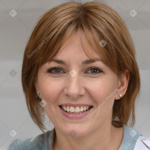 Joyful white young-adult female with medium  brown hair and blue eyes