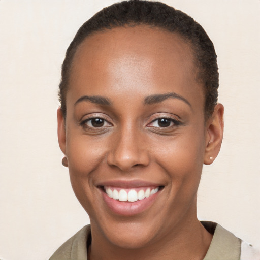 Joyful white young-adult female with short  brown hair and brown eyes