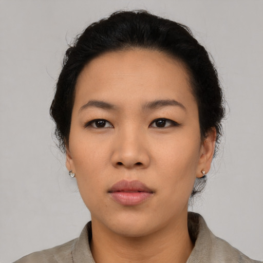 Neutral asian young-adult female with medium  black hair and brown eyes