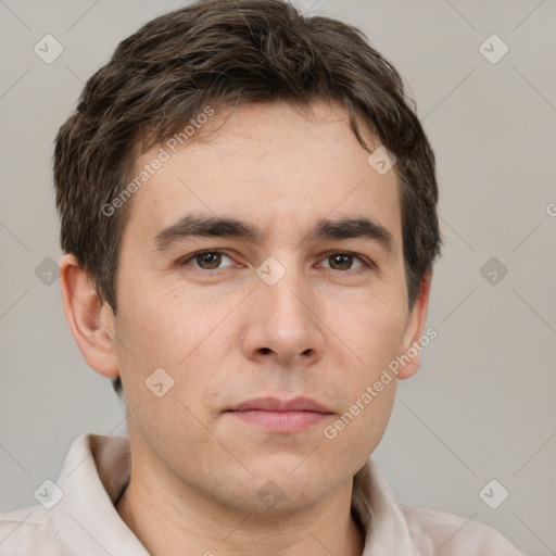 Neutral white young-adult male with short  brown hair and brown eyes