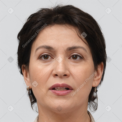 Joyful white adult female with medium  brown hair and brown eyes