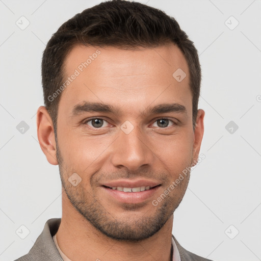 Joyful white young-adult male with short  brown hair and brown eyes