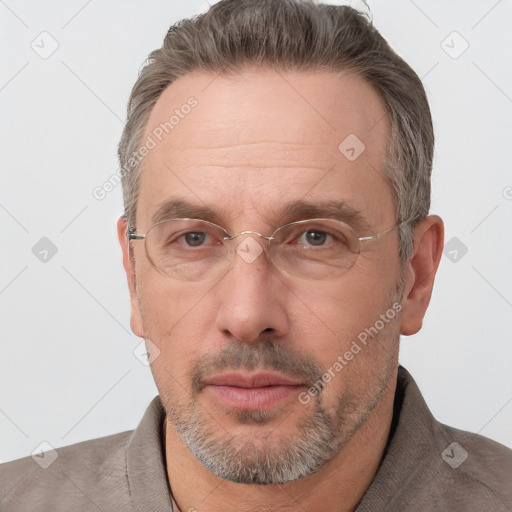 Neutral white adult male with short  brown hair and brown eyes