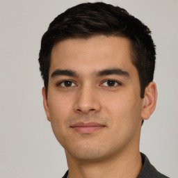 Neutral white young-adult male with short  black hair and brown eyes