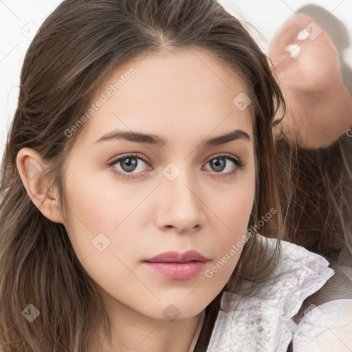 Neutral white young-adult female with long  brown hair and brown eyes