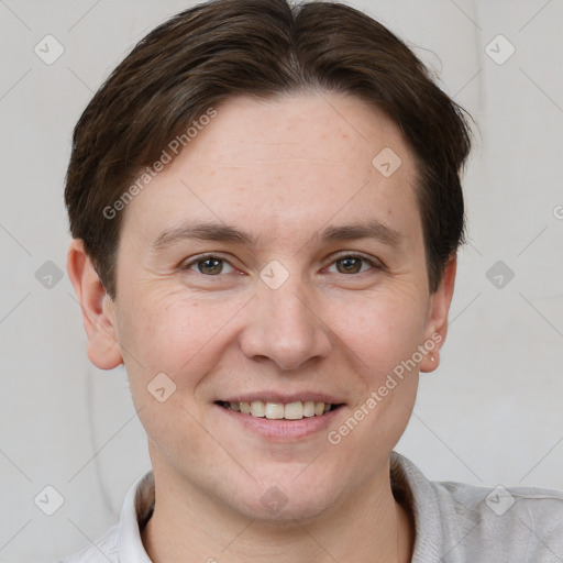 Joyful white young-adult female with short  brown hair and grey eyes