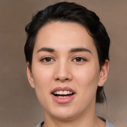 Joyful white young-adult female with medium  brown hair and brown eyes