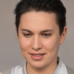 Joyful white adult female with short  brown hair and brown eyes