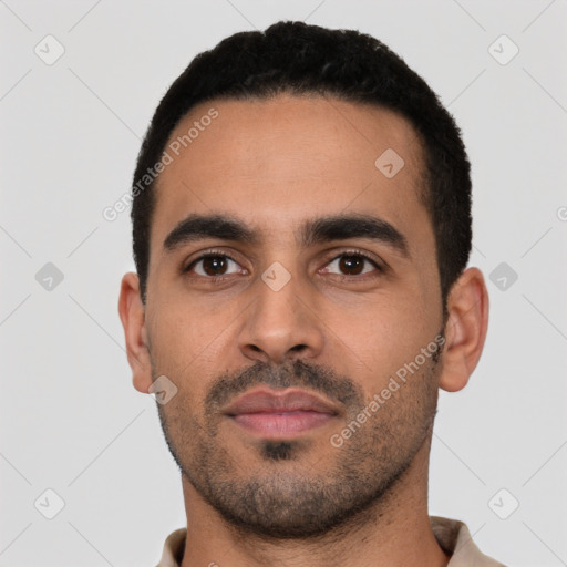Neutral latino young-adult male with short  black hair and brown eyes