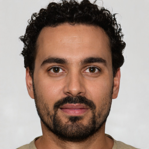 Neutral latino young-adult male with short  brown hair and brown eyes