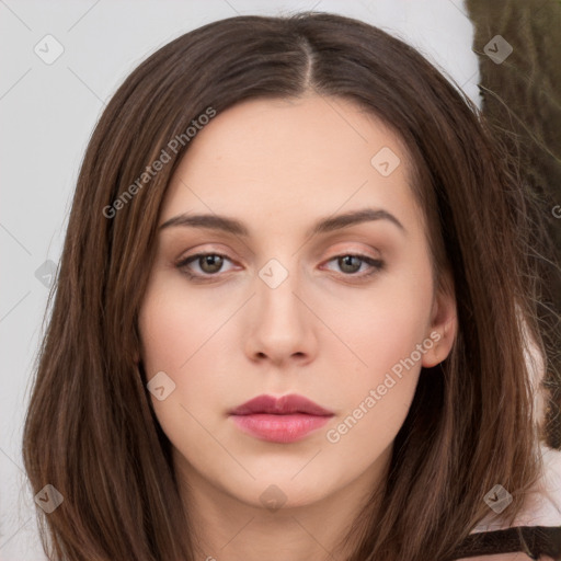 Neutral white young-adult female with long  brown hair and brown eyes