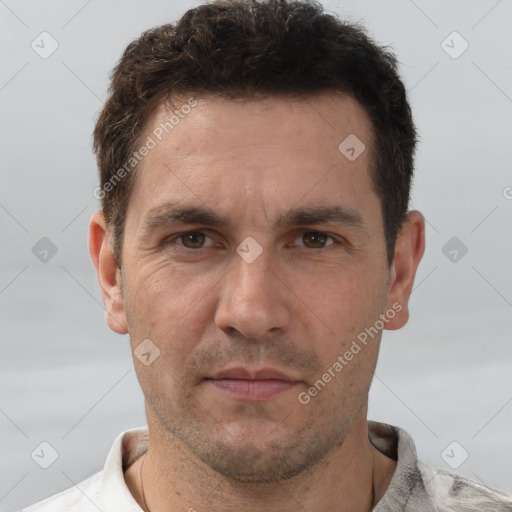 Neutral white adult male with short  brown hair and brown eyes