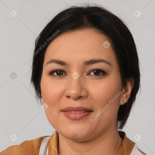 Joyful latino young-adult female with medium  brown hair and brown eyes