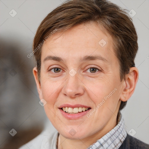 Joyful white adult female with short  brown hair and brown eyes