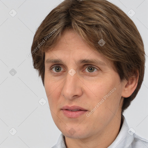 Joyful white adult female with short  brown hair and brown eyes