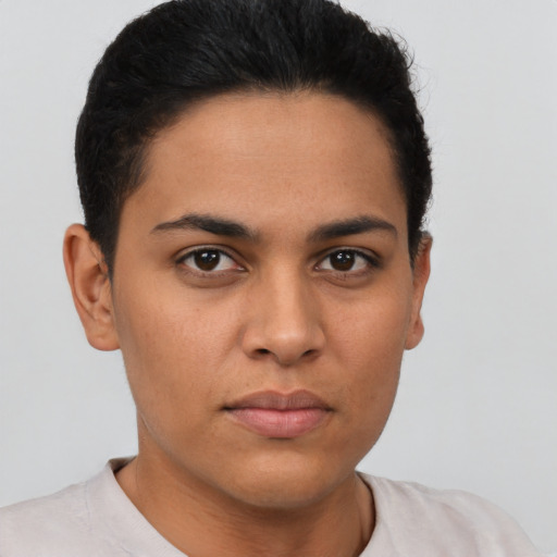 Neutral latino young-adult female with short  brown hair and brown eyes