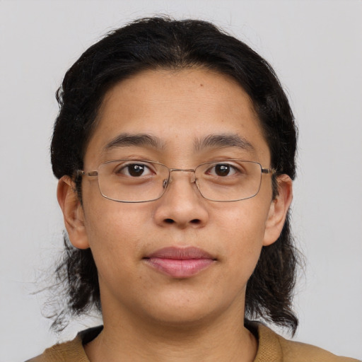 Neutral asian adult female with medium  brown hair and brown eyes