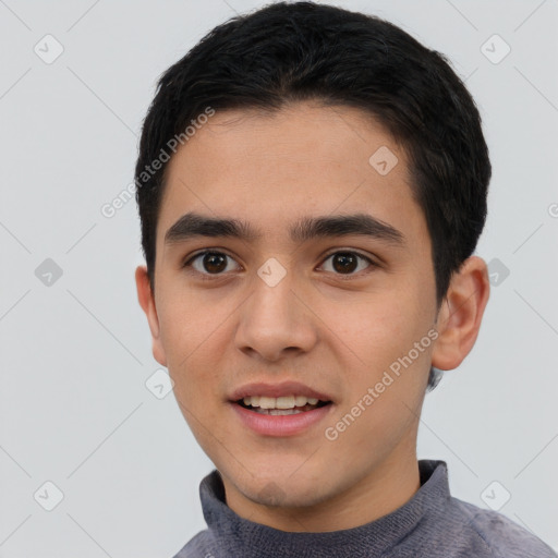 Joyful white young-adult male with short  black hair and brown eyes