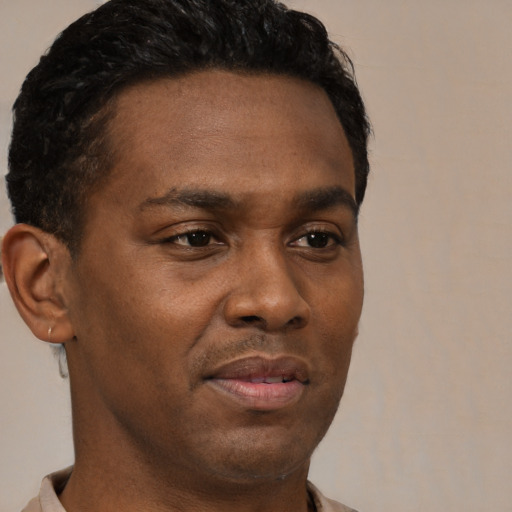 Neutral black young-adult male with short  brown hair and brown eyes
