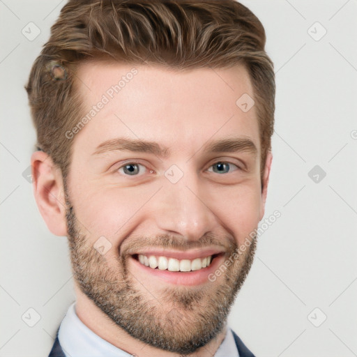 Joyful white young-adult male with short  brown hair and grey eyes