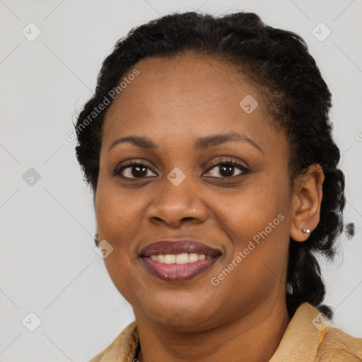 Joyful black young-adult female with medium  black hair and brown eyes