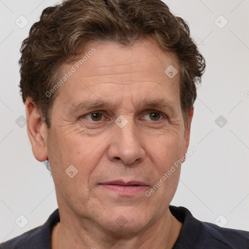 Joyful white middle-aged male with short  brown hair and brown eyes