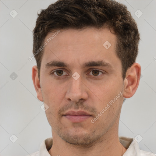 Neutral white young-adult male with short  brown hair and brown eyes