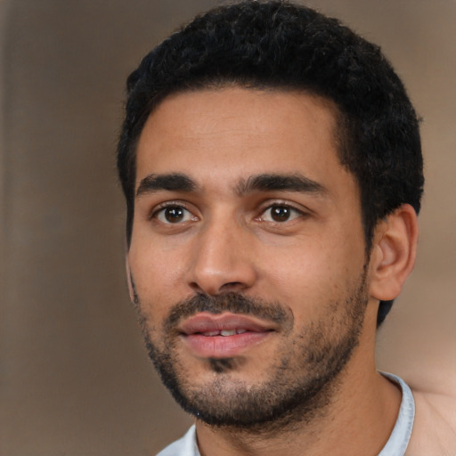 Neutral latino young-adult male with short  black hair and brown eyes