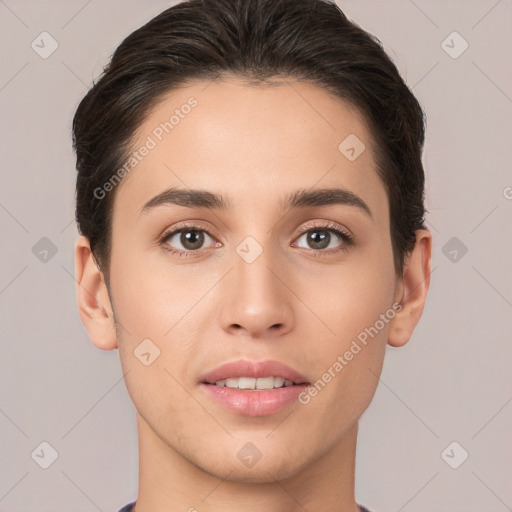 Joyful white young-adult female with short  brown hair and brown eyes