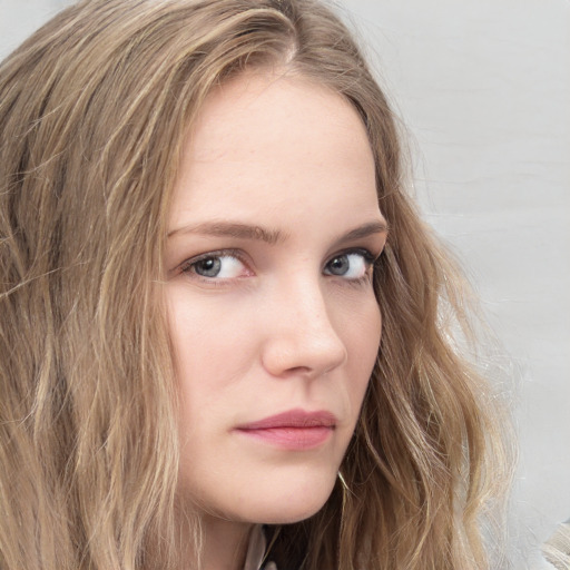 Neutral white young-adult female with long  brown hair and grey eyes