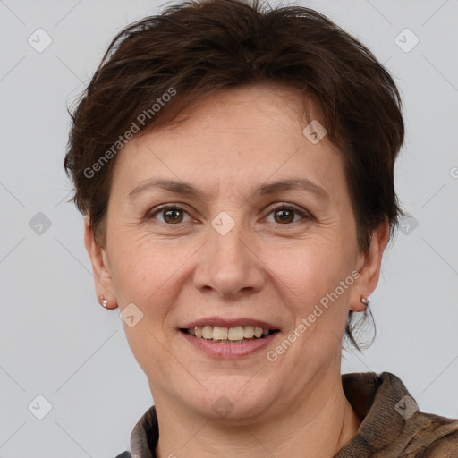 Joyful white adult female with short  brown hair and brown eyes