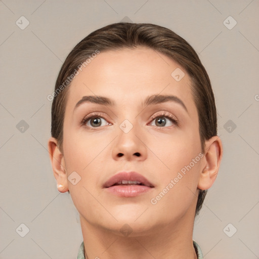 Neutral white young-adult female with short  brown hair and brown eyes