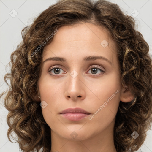 Joyful white young-adult female with medium  brown hair and green eyes