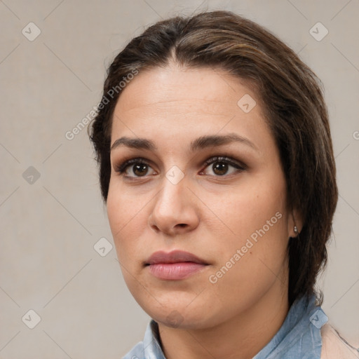 Neutral white young-adult female with medium  brown hair and brown eyes