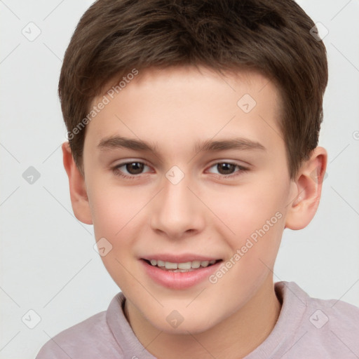 Joyful white child male with short  brown hair and brown eyes