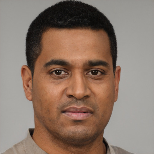 Neutral black young-adult male with short  black hair and brown eyes